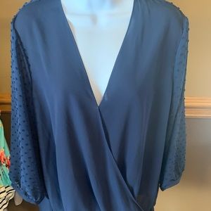 Womens top with a low cut neckline size large by Q&A